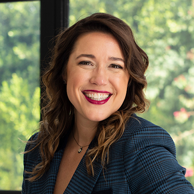 Anna Powers smiling in headshot