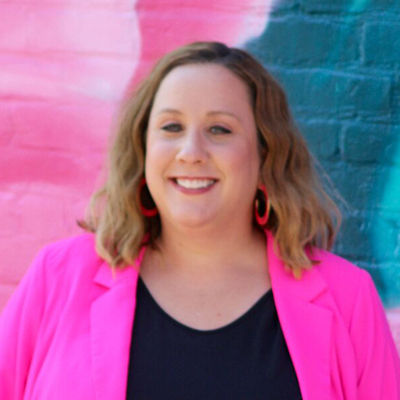 Elizabeth Burrows smiling in her headshot